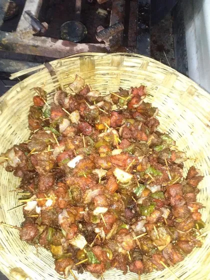 A basket full of freshly fried Chicken Stick Kebabs, a perfect and easy-to-eat starter for any event.