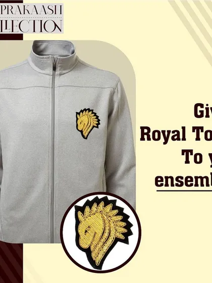 A grey zip-up jacket is given a royal touch with a gold horse-head patch. This shows how easily our appliqués can be added to everyday ensembles for a unique statement.