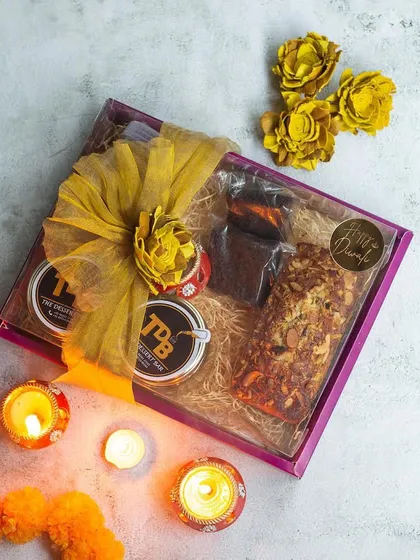 The 'Bliss' hamper is one of my most popular Diwali gifting options, packed with a variety of my best treats. It comes beautifully packaged, ready to bring joy to your loved ones.