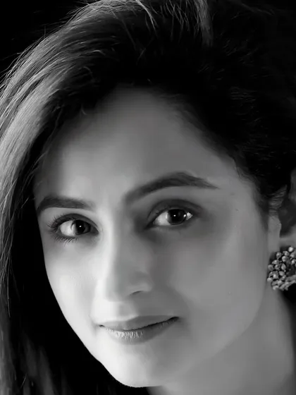 A timeless black and white close-up of actress Madirakshi Mundle. The soft lighting and gentle expression create a portrait that is both elegant and soulful.