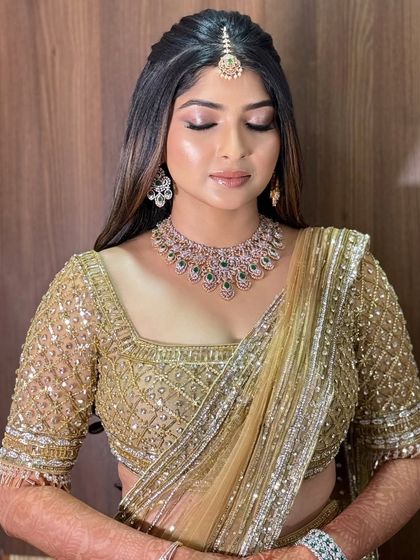 An eyes-closed shot to highlight the soft, shimmery eyeshadow and the flawless application of the makeup.