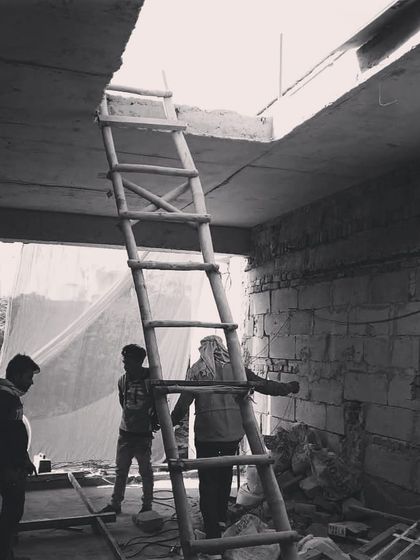 Creating an opening in the roof slab for a new skylight. This is a key part of our strategy to bring more natural light deep into the home's interior.