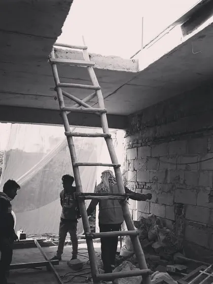 Creating an opening in the roof slab for a new skylight. This is a key part of our strategy to bring more natural light deep into the home's interior.