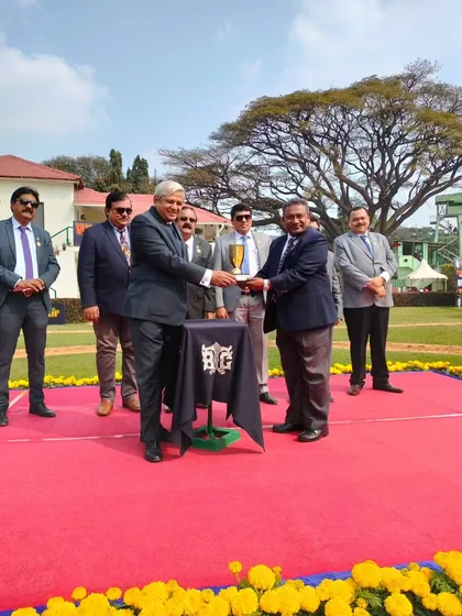 Presenting the Stewards Gold Cup.