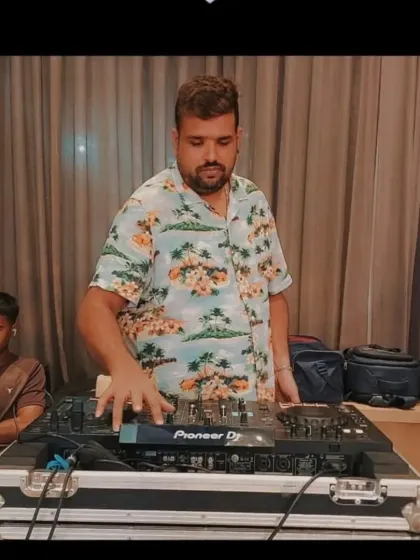 Another angle of me at the decks, ensuring the music for the evening is perfect.