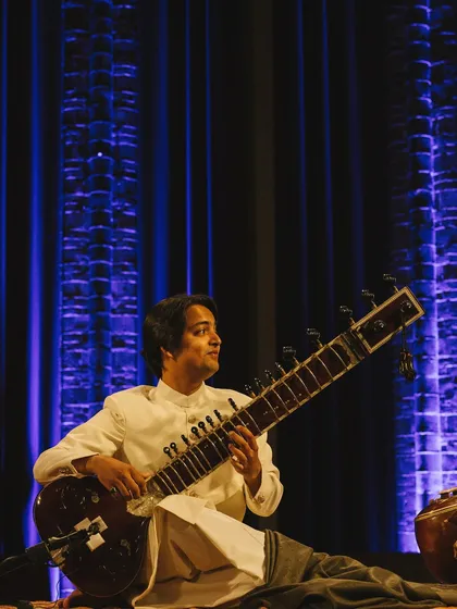 Another angle from the Amsterdam concert, capturing the joy and concentration of a live classical performance.