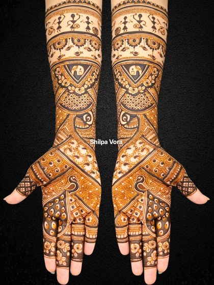 The same Warli-inspired bridal design against a dark background, making the intricate linework and details stand out.