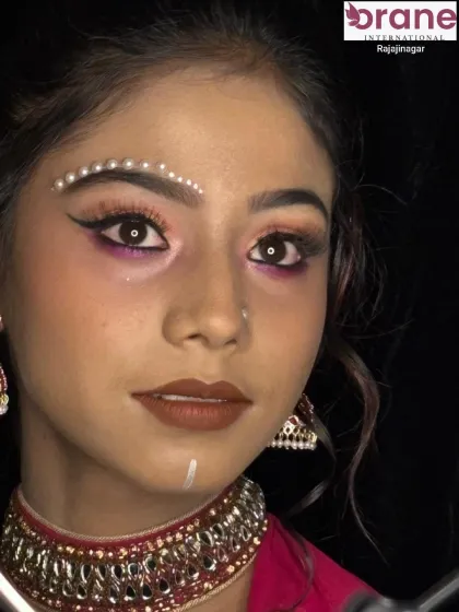 A close-up of the creative airbrush makeup, showing the flawless finish and intricate details.
