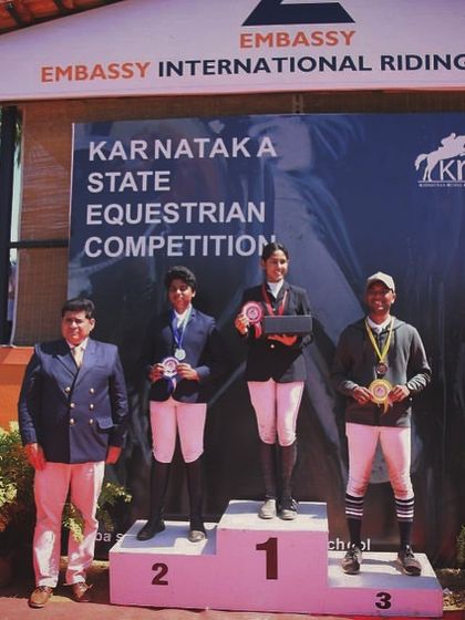 More champions from the Karnataka State Equestrian Competition. This podium photo captures the joy of victory and the results of dedicated training.