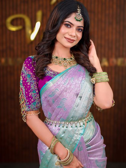 A series of photos showcasing a beautiful pastel purple and green silk saree. The soft, modern drape is perfect for a reception or pre-wedding event photoshoot.