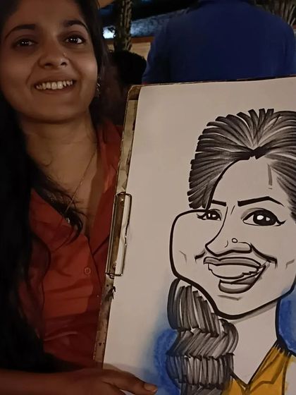 A happy diner with her portrait from a night at Mountain High.