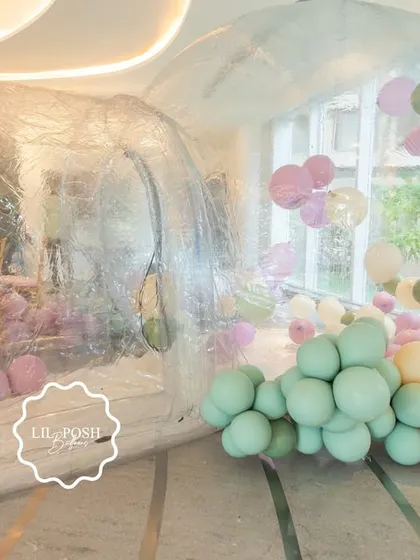 The magical bubble house at "Aahana's Onderland," filled with pastel balloons for a unique and exciting play experience.
