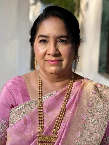 A beautiful, confident portrait. The makeup is designed to look fresh and youthful at any age.