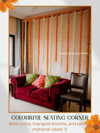 A simple yet effective way to create a festive seating corner. Here, I used long, hanging strings of orange and white marigolds to create a colorful backdrop for the sofa, instantly transforming a regular living room space.