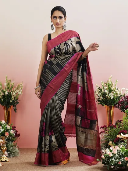The full view of the mixed-print saree, a modern and eclectic choice.