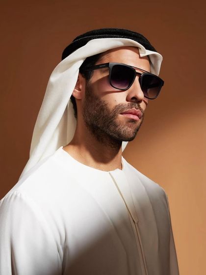 A key shot from the Titan Eye+ Dubai campaign. Styling this look involved pairing modern sunglasses with traditional Emirati clothing (Kandura and Ghutra) to create a look that is both authentic and stylish.