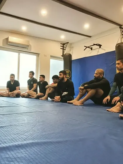 Head Coach Shaun Loyal teaching a great morning fundamentals class. Don't let the elements determine your destiny; get on the mats.