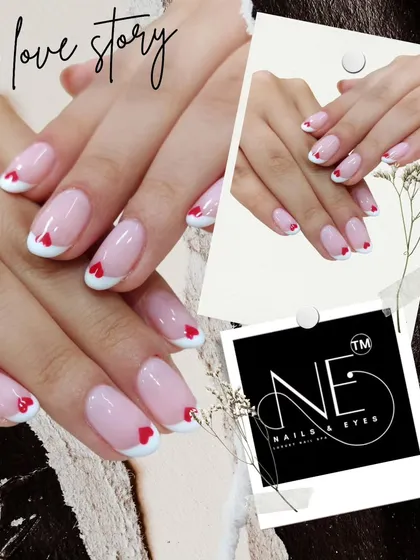 A sweet and romantic version of the French manicure. We replaced the classic line with a clean white tip and a tiny red heart for a lovely, subtle statement.
