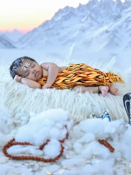 Om Namah Shivaya. For Mahashivaratri, I created this serene Bala Shiva theme with a baby sleeping peacefully in a snowy Kailash-inspired setting, complete with a miniature Trishul and Damaru.