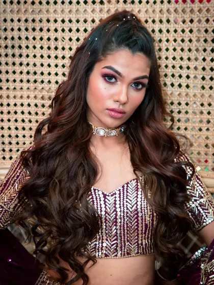 A close-up on the intense, beautifully blended eye makeup. I use rich pigments to create depth and drama, perfect for a bride who wants a high-fashion look.