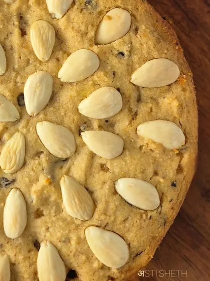 A close-up of the top of the Dundee cake, showing the beautiful arrangement of blanched almonds before baking.