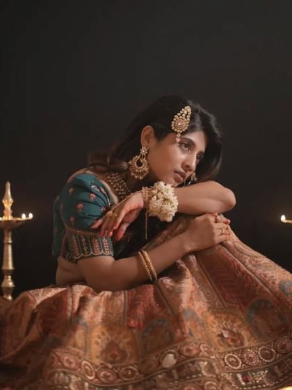 Another beautiful shot of our Heeramandi-inspired look. The deep colors and traditional jewellery are perfect for creating a memorable and artistic photoshoot.