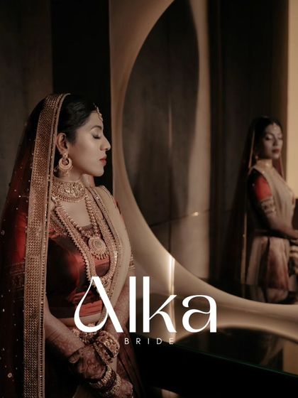 A creative portrait of Alka, her reflection in a curved mirror, her pose elegant and her expression calm.