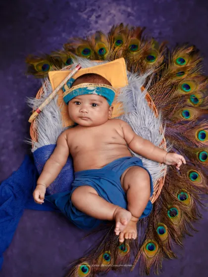 Our little Kanha. I take care to create these divine themes with beautiful details, like a backdrop of peacock feathers, to celebrate your faith and love.