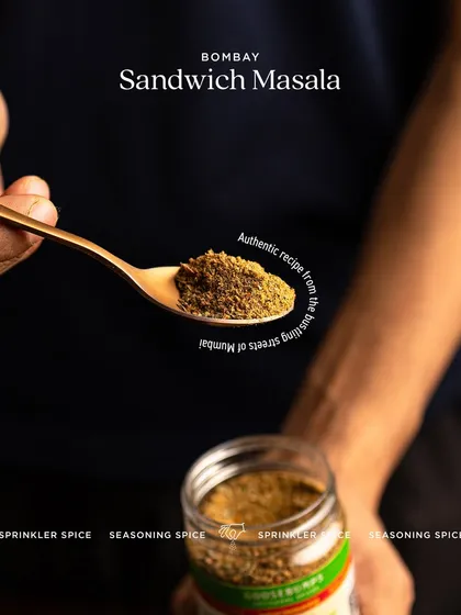 A spoonful of my Bombay Sandwich Masala, an authentic recipe from the bustling streets of Mumbai. This finely ground sprinkler spice is designed to give your sandwiches that perfect tangy and savoury kick.