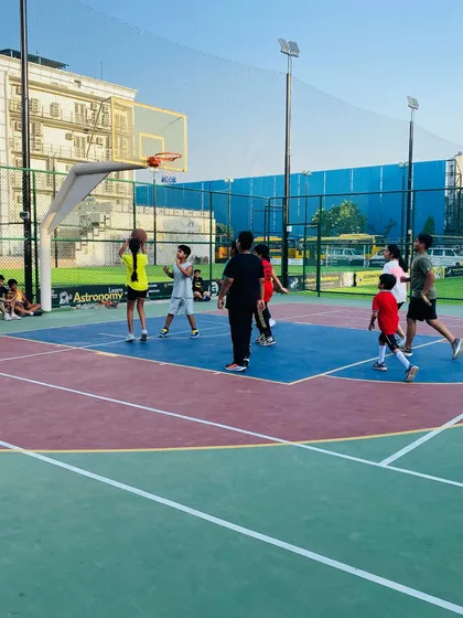 A female player takes a shot from the free-throw line.