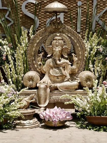 Big energy, bigger blessings. A grand Ganesha setup to welcome guests and begin the wedding festivities on an auspicious note.