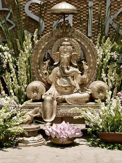 Big energy, bigger blessings. A grand Ganesha setup to welcome guests and begin the wedding festivities on an auspicious note.