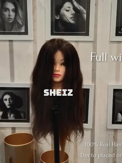 A full wig made from 100% real human hair, displayed on a mannequin. We offer full customization to create the perfect wig for you.