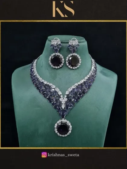 A unique greyish-blue version of our American diamond set. This sophisticated color is perfect for someone looking for an elegant and unconventional piece.