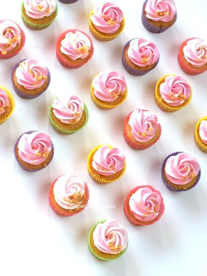 Simple and pretty pink swirl cupcakes in assorted colourful liners. I add a sprinkle of edible gold flakes to each one for a touch of elegance.