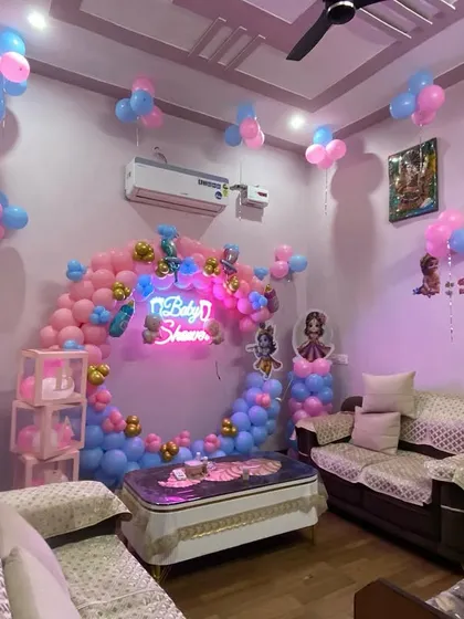 A slightly different angle of the popular Kanha ji baby shower decor, showing the full arrangement in a home setting.