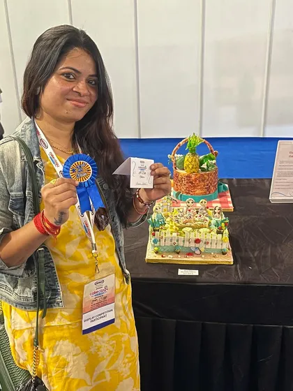 Another proud moment with my award ribbon and cake.