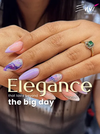For the bride who wants timeless elegance, I create nail art that lasts well beyond the big day. This design features delicate lavender and marble accents on a classic almond shape, perfect for engagement photos and wedding ceremonies.