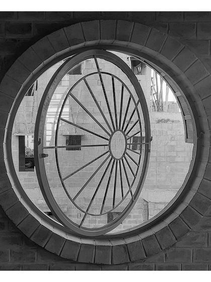 A circular pivot window at the 'VKR' site, a signature element in many of my projects.