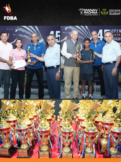 The trophies and a young winner at the district championship. We believe in rewarding young talent to motivate them on their sporting journey.