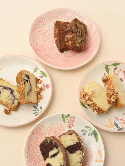 Soft, rich, and packed with flavor. This image shows slices of our various tea cakes, perfect for pairing with your favorite cup of coffee or tea.