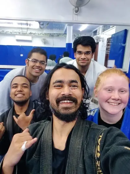 Welcoming international students and visitors is a huge part of our culture. Here we are with a student from abroad, sharing the universal language of Jiu-Jitsu.