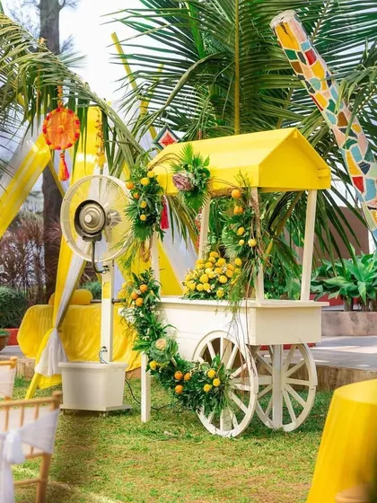 A charming detail from a Haldi event: a decorative cart filled with lemons and flowers. These small, thematic props add personality and create wonderful photo opportunities around the venue.