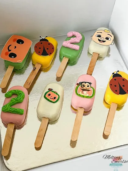 How cute are these Cocomelon themed cakesicles? We made these colorful treats as part of a dessert table for a 2nd birthday. Each one is decorated with characters and details from the show, making them a huge hit with the kids.