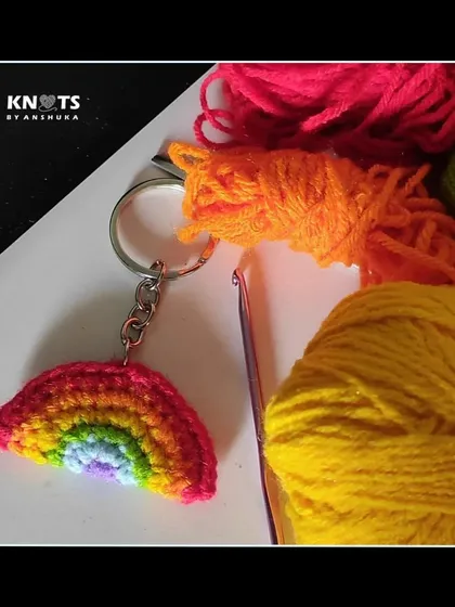 Add a splash of color to your day with this simple crochet rainbow keychain. It's a bright and cheerful accessory.