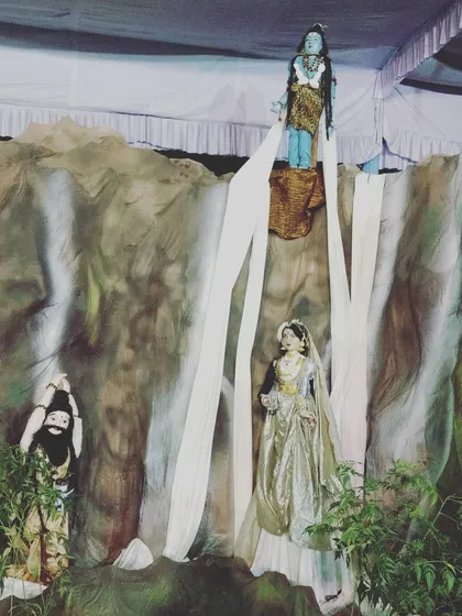 A scene depicting the descent of the Ganga, with Lord Shiva, Bhagiratha, and Ganga Devi. Our doll displays often narrate complex stories through static, beautifully arranged scenes.