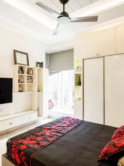 Another angle of the bedroom from image 13, showing the layout and balance of colors.