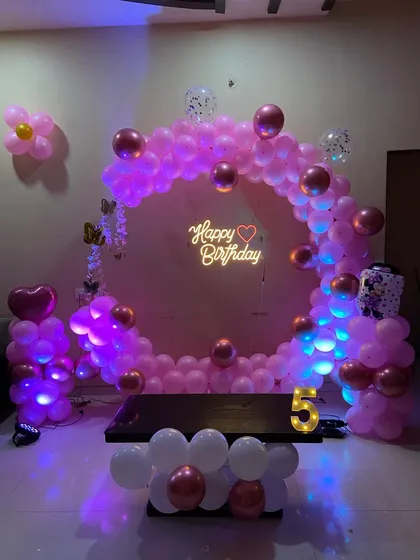 The same pink and rose gold setup under blue lighting, showing how lighting can change the atmosphere.