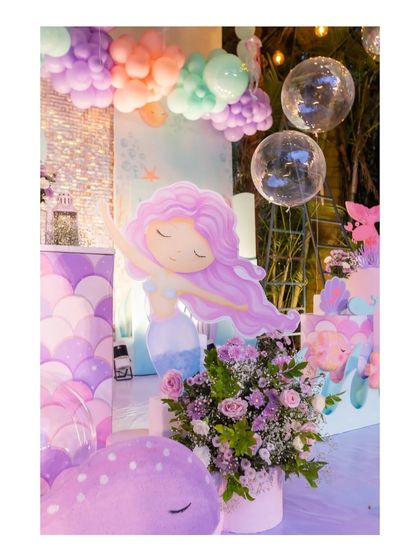 A duplicate image of the lovely mermaid cutout, a favorite prop for our under-the-sea parties.