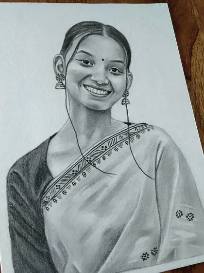This sketch of a woman in a saree with jhumka earrings highlights my attention to traditional details and accessories.